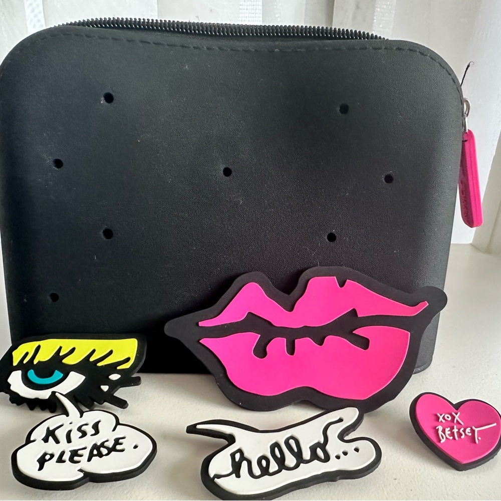 Betsy Johnson rubber make up case with charms. 6”x8”